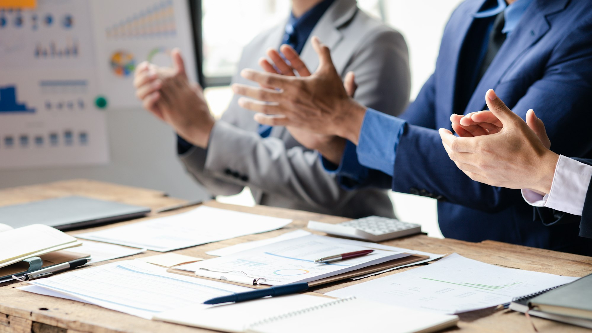 Group business people applauding at startup company meeting, business meetings, startup company sale